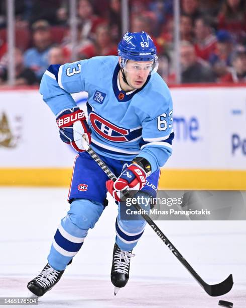 Evgenii Dadonov of the Montreal Canadiens skates the puck during the second period against the New York Islanders at Centre Bell on February 11, 2023...