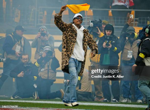 Wiz Khalifa waves a terrible towel before the game between the Baltimore Ravens and the Pittsburgh Steelers on December 11, 2022 at Acrisure Stadium...
