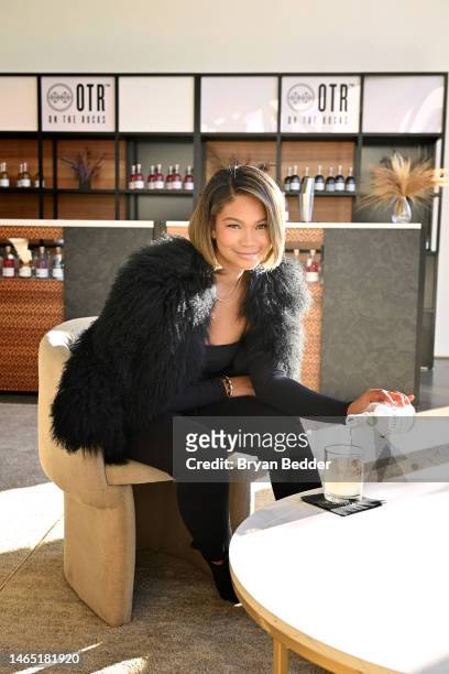 Chanel Iman enjoying an OTR™ Premium Cocktail between shows at NYFW: The Shows 2023 at Spring Studios on February 11, 2023 in New York City.