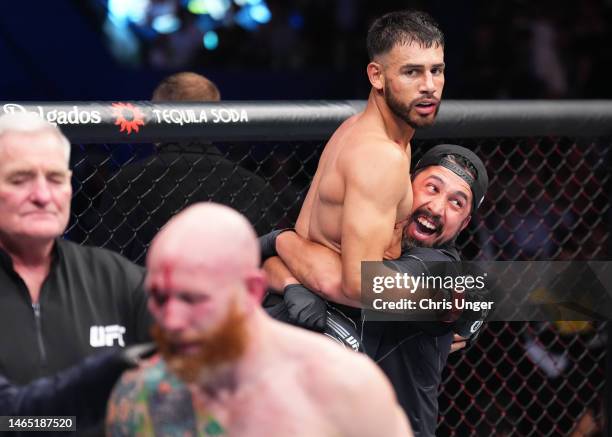 Yair Rodriguez of Mexico reacts after his submission victory over Josh Emmett in the UFC interim featherweight championship fight during the UFC 284...