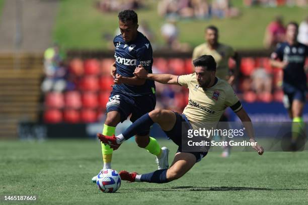 Nishan Velupillay of Victory competes for the ball with Kosta Grozos of the Jets during the round 16 A-League Men's match between Newcastle Jets and...