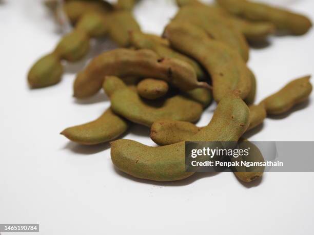 tamarind on white background - tamarind stock pictures, royalty-free photos & images