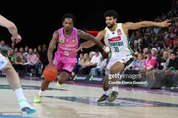 Sam McDaniel of Tasmania defends Barry Brown Jnr of the Breakers during the game one of the NBL Semi Final series between New Zealand Breakers and...