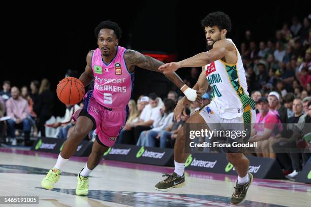 Sam McDaniel of Tasmania defends Barry Brown Jnr of the Breakers (L during the game one of the NBL Semi Final series between New Zealand Breakers and...