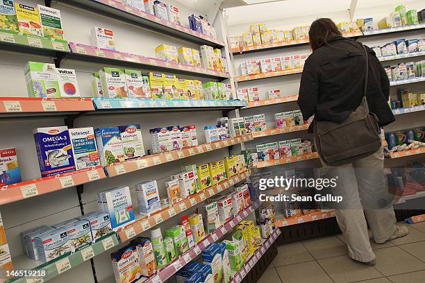 Shopper looks among health supplements on offer at a drugstore on June 12, 2012 in Berlin, Germany. Health supplements, including vitamins,...