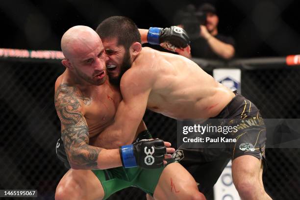 Alex Volkanovski of Australia battles Islam Makhachev of Russia in the UFC lightweight championship fight during UFC 284 at RAC Arena on February 12,...