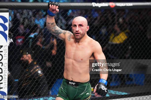 Alexander Volkanovski of Australia reacts after the conclusion of his UFC lightweight championship fight against Islam Makhachev of Russia during the...