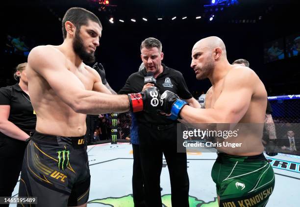 Opponents Islam Makhachev of Russia and Alexander Volkanovski of Australia face off prior to their UFC lightweight championship fight during the UFC...