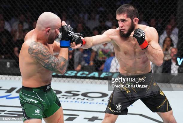 Islam Makhachev of Russia punches Alexander Volkanovski of Australia in the UFC lightweight championship fight during the UFC 284 event at RAC Arena...