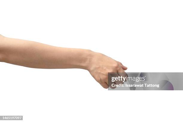 hands clenching something isolated on white background - human hand imagens e fotografias de stock