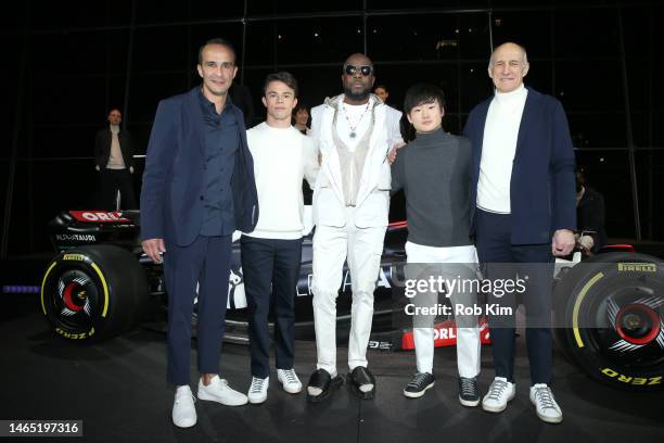 Ahmet Mercan, CEO of AlphaTauri, Nyck de Vries, Wyclef Jean, Yuki Tsunoda, and Franz Tost during the AlphaTauri AW23 presentation during New York...