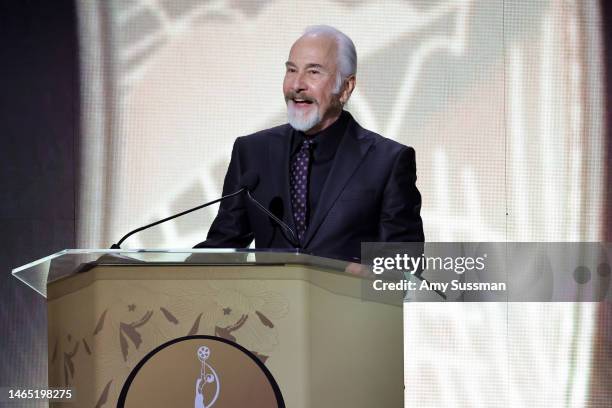 Rick Baker speaks onstage during the 10th Annual Make-Up Artists & Hair Stylists Guild Awards at The Beverly Hilton on February 11, 2023 in Beverly...