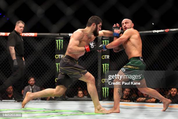 Islam Makhachev of Russia battles Alex Volkanovski of Australia in the UFC lightweight championship fight during UFC 284 at RAC Arena on February 12,...