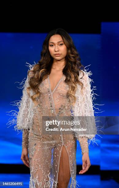 Model walks the runway wearing Walter Mendez during New York Fashion Week Powered by Art Hearts Fashion at The Angel Orensanz Foundation on February...