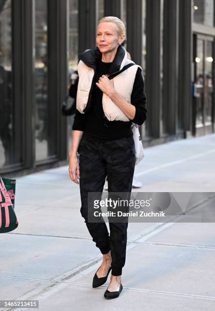 Model Bethany Nagy is seen wearing a puff vest, black sweater, black pants and balck flats outside the Area show during New York Fashion Week F/W...