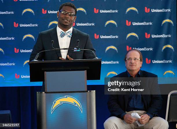 LaDainian Tomlinson with San Diego Chargers owner Dean Spanos announces his retirement from professional football, after signing a one-day contract...