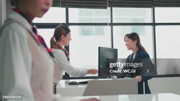 Travel Checking Business Travel Checkingin At The Airport High-Res Stock Photo - Getty ...