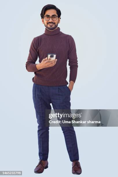 full portrait of a young businessman while using phone. - full stock pictures, royalty-free photos & images