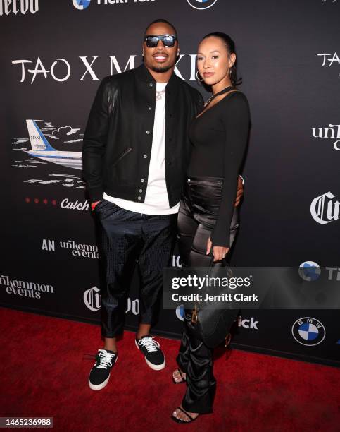 Christian Kirksey and Kendall Jeffries attend Tao X Maxim Big Game Party: An unKommon events Production at Southwest Jet Center on February 11, 2023...