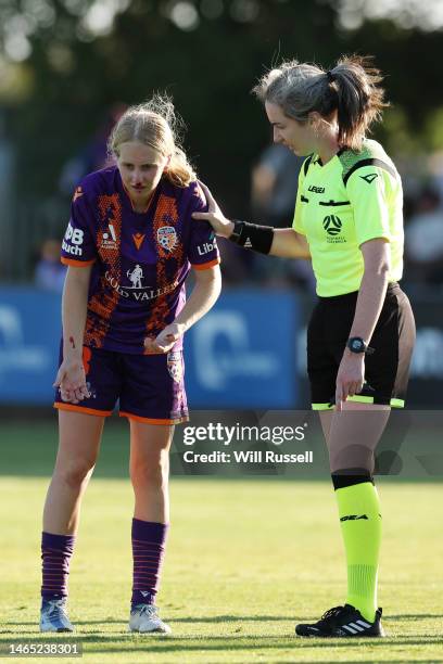 Hana Lowry of the Glory is assisted by Match referee Georgia Ghirardello after having a nose bleed during the round 14 A-League Women's match between...