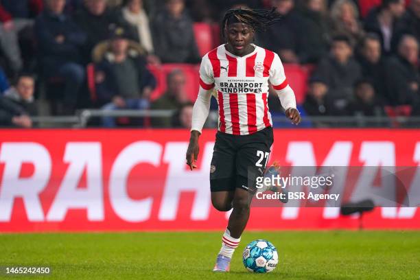 Johan Bakayoko of PSV runs with the ball during the Eredivisie match between PSV and FC Groningen at the Philips Stadion on February 11, 2023 in...