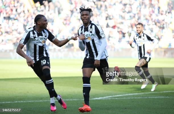 Destiny Udogie of Udinese celebrates scoring a goal with Kingsley Ehizibue during the Serie A match between Udinese Calcio and US Sassuolo at Dacia...
