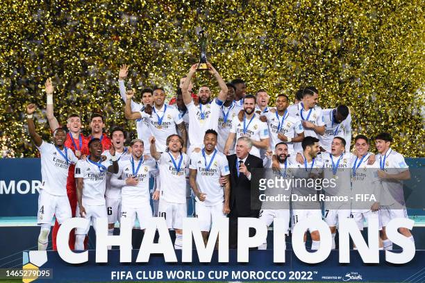 Karim Benzema of Real Madrid lifts the FIFA Club World Cup Morocco 2022 Trophy following their sides victory in the FIFA Club World Cup Morocco 2022...