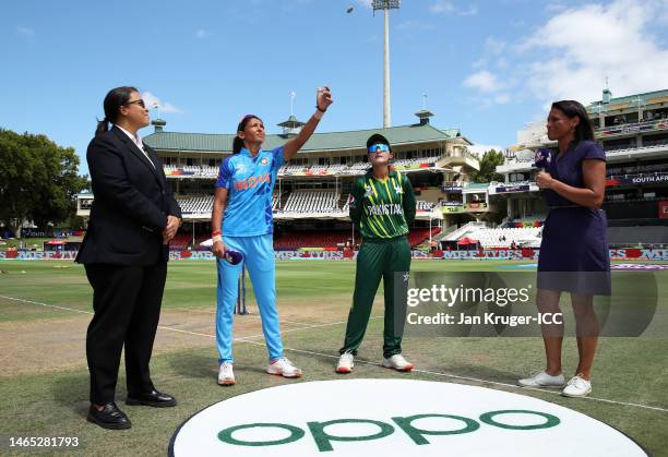 Harmanpreet Kaur of India flips the coin as Bismah Maroof of Pakistan looks on ahead of the ICC Women's T20 World Cup group B match between India and...