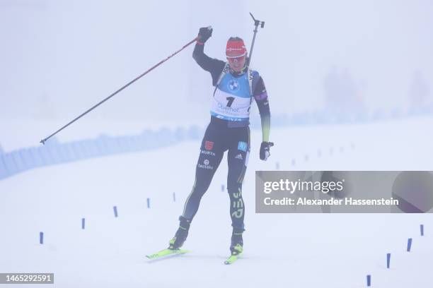 Denise Herrmann-Wick of Germany celebrates as she approaches the finish line for second place during the Women 10 km Pursuit at the IBU World...