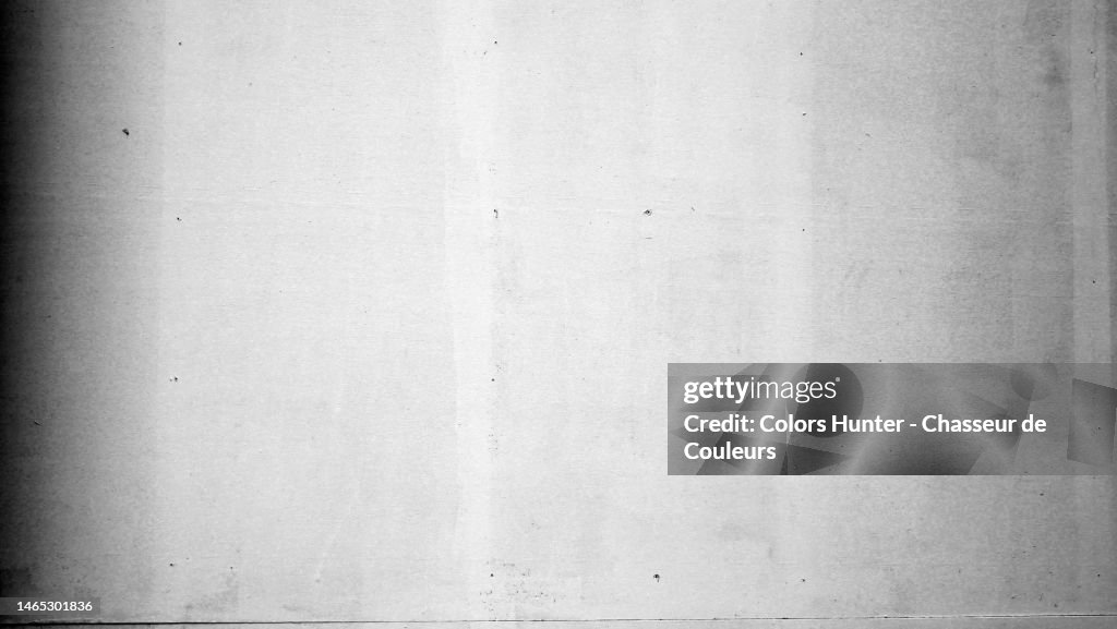White painted empty wood panel with a shadow