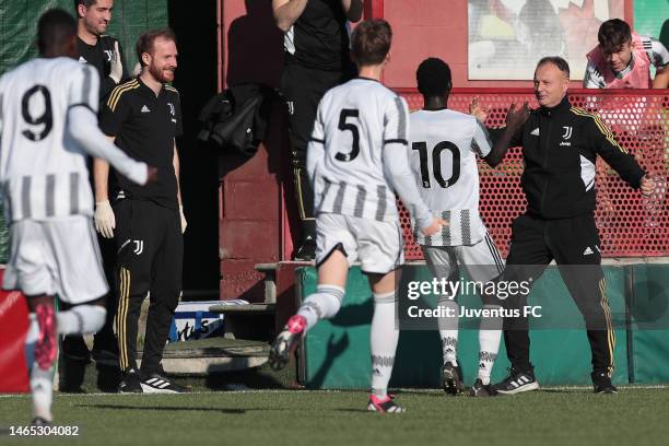 Demba Sall Samb of Juventus celebrates his goal with his coach Marcello Benesperi during the match between Torino U15 and Juventus U15 at Cit Turin...