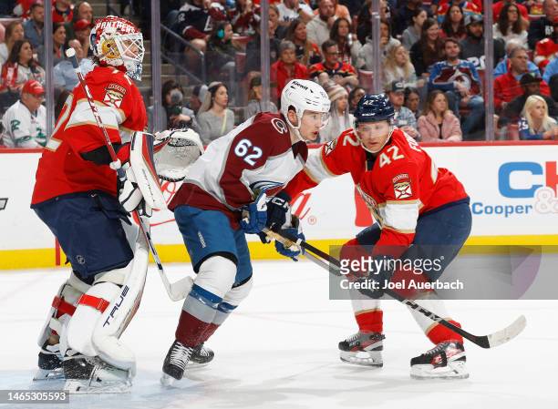Gustav Forsling of the Florida Panthers battles for position in front of the net with Artturi Lehkonen of the Colorado Avalanche at the FLA Live...