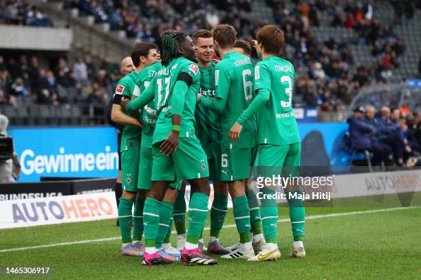 Nico Elvedi of Borussia Monchengladbach celebrates with teammates after scoring the team's first goal during the Bundesliga match between Hertha BSC...