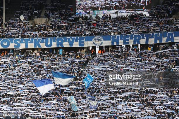 Hertha BSC shows their support with scarfs and flags prior to the Bundesliga match between Hertha BSC and Borussia Moenchengladbach at Olympiastadion...