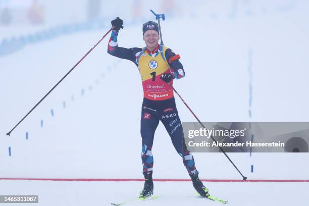 Johannes Thingnes Boe of Norway celebrates as he crosses the finish line to win the Men 12.5 km Pursuit at the IBU World Championships Biathlon...