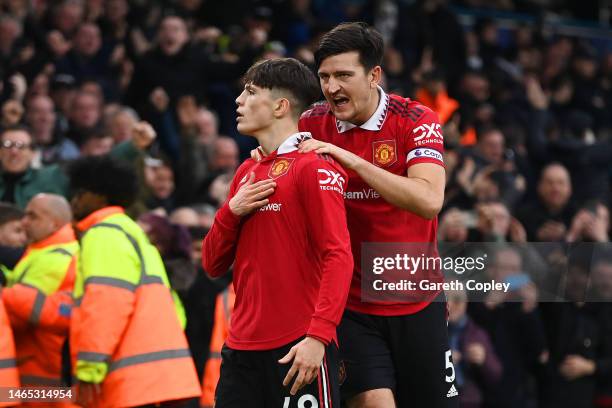 Alejandro Garnacho of Manchester United celebrates with teammate Harry Maguire after scoring the team's second goal during the Premier League match...