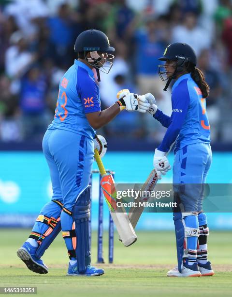 Richa Ghosh and Jemimah Rodrigues of India interact during the ICC Women's T20 World Cup group B match between India and Pakistan at Newlands Stadium...