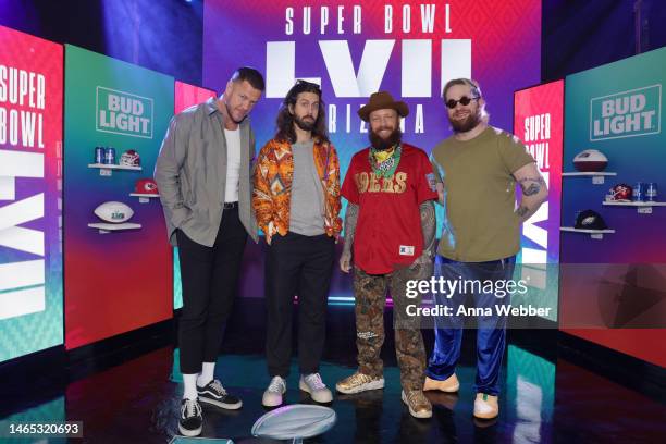 Dan Reynolds, Daniel Wayne Sermon, Daniel Platzman and Ben McKee of Imagine Dragons attend the Bud Light Super Bowl Music Festival at Footprint...