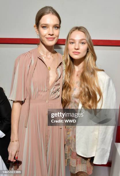 Natalia Vodianova and Neva Portman in the front row