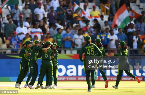 Players of Pakistan celebrate the wicket of Shafali Verma of India during the ICC Women's T20 World Cup group B match between India and Pakistan at...