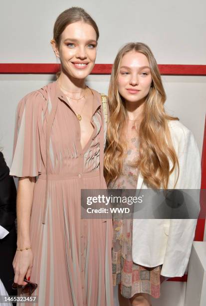 Natalia Vodianova and Neva Portman in the front row