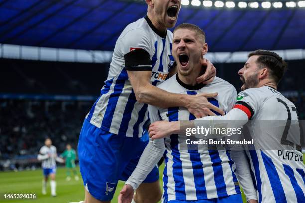 Marton Dardai of Hertha BSC celebrates with teammates after scoring his team's second goal during the Bundesliga match between Hertha BSC and...