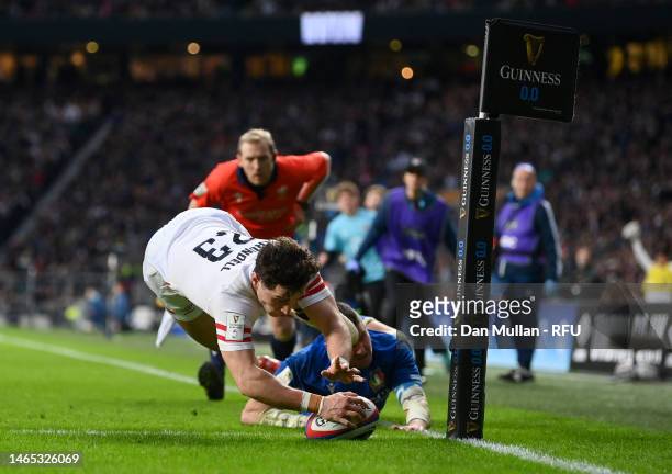 Henry Arundell of England dives over the line to score the side's fifth try during the Six Nations Rugby match between England and Italy at...