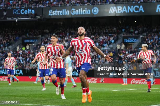 Memphis Depay of Atletico Madrid celebrates after scoring the team's first goal during the LaLiga Santander match between RC Celta and Atletico de...