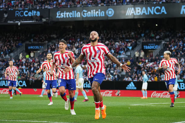 Memphis Depay of Atletico Madrid celebrates after scoring the team's first goal during the LaLiga Santander match between RC Celta and Atletico de...