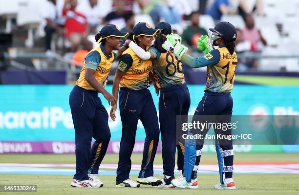 Players of Sri Lanka celebrate the wicket of Murshida Khatun of Bangladesh during the ICC Women's T20 World Cup group A match between Bangladesh and...