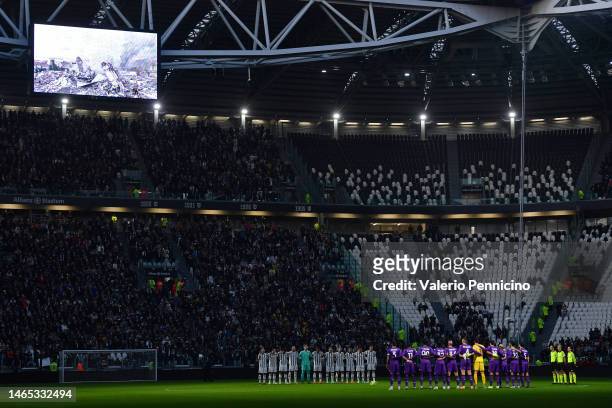 Players, officials and fans observe a minute of silence for the victims of the earthquake in Turkey in Syria prior to the Serie A match between...