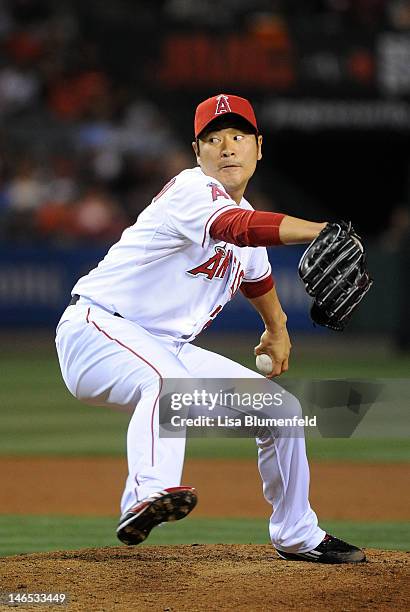 Hisanori Takahashi of the Los Angeles Angels of Anaheim pitches against the San Francisco Giants at Angel Stadium of Anaheim on June 18, 2012 in...