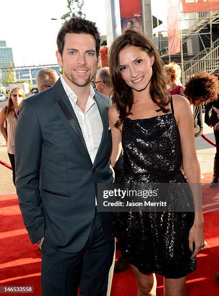 Singer Chris Mann and Laura Perloe arrive at the premiere of "Seeking a Friend for the End of the World" at the 2012 Los Angeles Film Festival held...