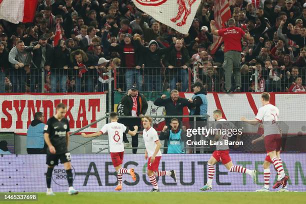 Timo Hubers of 1.FC Koln celebrates after scoring the team's first goal during the Bundesliga match between 1. FC Koeln and Eintracht Frankfurt at...